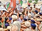 Congress supporters protesting outside the municipal corporation office in Chandigarh on Monday. (Ravi Kumar/HT)