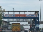 Days after the National Highways Authority of India (NHAI) began operations at the Bastara toll plaza through a multi-lane free flow (MLFF) tolling system, villagers living along the site have demanded the resumption of free travel provided earlier. (HT Photo)