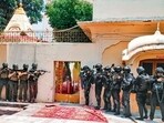 Jammu and Kashmir Police's Special Operations Group (SOG) and National Security Guard (NSG) personnel in action during a drill at Raghunath Temple ahead of the Amarnath Yatra, in Jammu on Monday. (ANI)