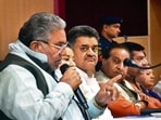 Krishan Lal Panwar, minister of development and panchayats listening to the complaints of the peopleduring the grievance redressal committee meeting at the PWD Rest House in Sector 1, Chandigarh on Tuesday. (Sant Arora/HT)