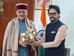 MP Anurag Thakur meets Himachal governor Kavinder Gupta in Shimla on Monday. (HT Photo)