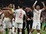 Morocco celebrates after winning the penalty shootout against Netherlands. (AFP)