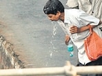 Mumbai, India - Jan. 7, 2015 : Man spitting at Bandra station, in Mumbai, India, on Wednesday, January 7, 2015. (Photo by Vidya Subramanian/ Hindustan Times) (Hindustan Times)