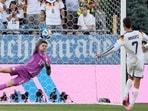 Paraguay's goalkeeper Orlando Gill saves the penalty kick by Germany's Kai Havertz during the penalty shootout. (AFP)