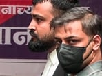 Sahil Goyal (wearing mask), accused Siya Goyal's brother, and their advocate arrive at Vadgaon Maval Police Station in Lonavala on Monday. (ANI Video Grab) (ANI Video Grab)