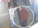 CCTV footage showed the man trying to break the lock of a mobile shop using an iron rod while wearing a mask commonly seen at political rallies featuring the prime minister's face.