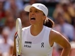 Poland's Iga Swiatek celebrates after winning her first round match against Taylor Townsend of the U.S.