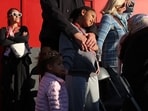 Husband of US player Serena Williams, Alexis Ohanian and their children, Alexis and Adira watch after she plays a round of 16, doubles match with Canada's Victoria Mboko at the HSBC WTA tennis Championships at Queen's Club in west London on June 9, 2026. (Photo by Adrian Dennis / AFP)
