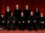 FILE PHOTO: U.S. Supreme Court justices pose for their group portrait at the Supreme Court in Washington, U.S., October 7, 2022. Seated (L-R): Justices Sonia Sotomayor, Clarence Thomas, Chief Justice John G. Roberts, Jr., Samuel A. Alito, Jr. and Elena Kagan. Standing (L-R): Justices Amy Coney Barrett, Neil M. Gorsuch, Brett M. Kavanaugh and Ketanji Brown Jackson. REUTERS/Evelyn Hockstein/File Photo