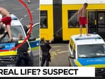 GTA in real life? Man climbs police car, humiliates German cops in wild video game-like chase GTA in real life? Man climbs police car, humiliates German cops in wild video game-like chase