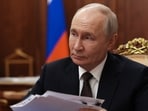 Russian President Vladimir Putin listens to Russia's Commissioner for Human Rights Yana Lantratova at the Kremlin in Moscow, Monday, June 29, Russian President Vladimir Putin listens to Russia's Commissioner for Human Rights Yana Lantratova at the Kremlin in Moscow, Monday, June 29,