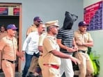 Accused Chetan Chaudhary being taken to be produced before the court in relation to Ketan Agarwal murder case, in Lonavala on Monday. 