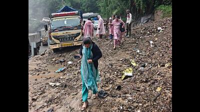 A truck stuck in debris after rain-triggered mudslide in Shimla on Tuesday. (Deepak Sansta/HT) A truck stuck in debris after rain-triggered mudslide in Shimla on Tuesday. (Deepak Sansta/HT)