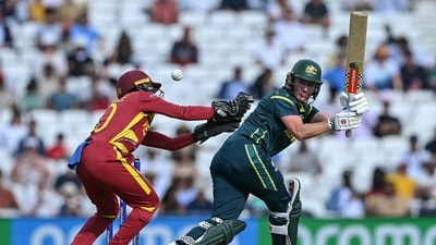 Beth Mooney hits the ball over West Indies' Shemaine Campbelle. (AFP) Beth Mooney hits the ball over West Indies' Shemaine Campbelle. (AFP)