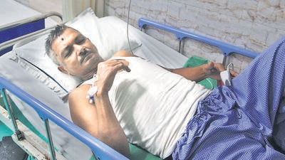 Thane, India - June -30, 2026: Due to heavy rainfall, a huge tree collapsed in the Wagle Estate area of Thane city. During the incident, a 53-year-old man, Pawan Jha, was injured after a branch of the fallen tree struck him while he was on his way to work in the morning. He is currently undergoing treatment at a private hospital. ,in Thane ,in Mumbai, India, on, Tuesday, June -30, 2026. ( photo by Praful Gangurde / Hindustan Times ) (praful Gangurde) Thane, India - June -30, 2026: Due to heavy rainfall, a huge tree collapsed in the Wagle Estate area of Thane city. During the incident, a 53-year-old man, Pawan Jha, was injured after a branch of the fallen tree struck him while he was on his way to work in the morning. He is currently undergoing treatment at a private hospital. ,in Thane ,in Mumbai, India, on, Tuesday, June -30, 2026. ( photo by Praful Gangurde / Hindustan Times ) (praful Gangurde)