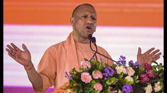 Chief minister Yogi Adityanath addresses the inauguration and foundation stone-laying ceremony of development projects, in Rampur. (PTI Photo)