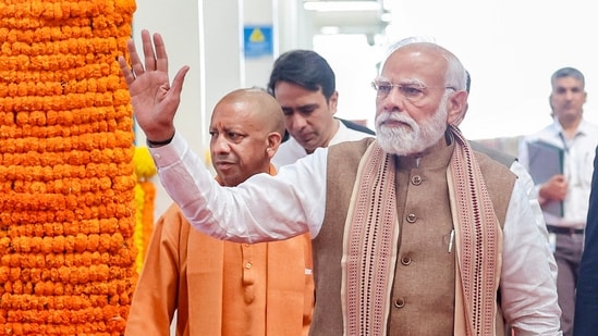 The hoardings feature photographs of PM Modi and Yogi Adityanath. (Photo: narendramodi.in/PTI)