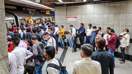 New Delhi: Commuters wait in a queue to board a metro at a platform at a metro station after services on the Blue Line were delayed, in New Delhi, (PTI/ Representative)
