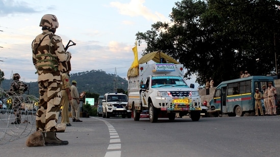 The Jammu & Kashmir Union Territory administration along with police personnel and security forces conduct a dry run of the Amarnath Yatra on the Jammu-Srinagar highway, in Udhampur. (ANI)