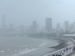 A view of the Marine Drive amid rainfall, in Mumbai on Wednesday. (ANI Video Grab)(ANI Video Grab)