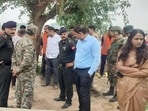 Ambala deputy commissioner Ajay Singh Tomar and army officers reached the site to oversee the rescue operation at Dhaneora village on Tuesday morning. (HT Photo)