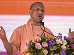 Chief minister Yogi Adityanath addresses the inauguration and foundation stone-laying ceremony of development projects, in Rampur. (PTI Photo)