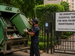 The Haryana Registrar General of Societies has ruled that RWAs cannot cut off essential services, such as garbage collection, or deactivate digital access systems to force residents to pay outstanding maintenance dues (ChatGPT generated photo)
