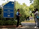 Members of media work outside the Delhi Gymkhana Club, one of the oldest clubs in India.