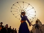A Sikh youth performs during a 'Nagar Kirtan' procession at the Golden Temple in Amritsar.