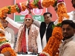 Samajwadi Party chief Akhilesh Yadav celebrated his 53rd birthday in Lucknow on July 1. Thousands of supporters gathered at the party headquarters, where he cut a massive cake with a sword and distributed bicycles to students in Lucknow. (HT Photo)