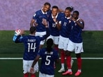 France's forward #10 Kylian Mbappe celebrates scoring his team's third goal with teammates during the 2026 World Cup round of 32 football match between France and Sweden