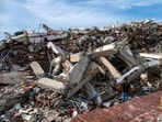 The video shows a building turned into rubble seconds after the earthquake hit.