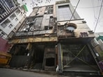 The ground floor, where investigators said the fire began, still shows signs of destruction, while rooms across the building remain largely untouched. (Sanchit Khanna/HT)
