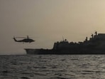 This US Navy handout photo released by US Central Command Public Affairs shows an MH-60R Sea Hawk taking off of the flight deck on May 19, 2026.