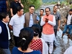 Union ministers Shivraj Singh Chouhan and Kiren Rijiju visited the flood-affected Keyi Panyor district. (HT Sourced Photo)