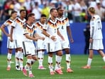 Joshua Kimmich celebrates as Jamal Musiala scores the team's third penalty in GER vs PAR.