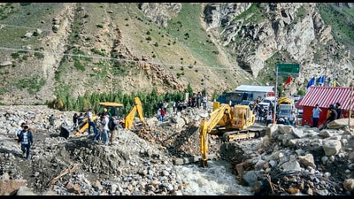 BRO personnel use excavators to clear debris from the Manali-Leh Highway near Jispa after a cloudburst triggered flash floods, in Lahaul and Spiti district, Himachal Pradesh, on Wednesday. (PTI) BRO personnel use excavators to clear debris from the Manali-Leh Highway near Jispa after a cloudburst triggered flash floods, in Lahaul and Spiti district, Himachal Pradesh, on Wednesday. (PTI)