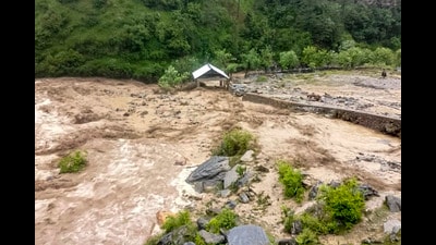 Debris and mud flow across an area after heavy rainfall triggered flash floods, at Gandoh in Doda district of Jammu and Kashmir, on Wednesday. (PTI)
