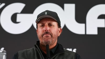 Phil Mickelson's wife, Amy, supports him amid renewed allegations regarding his past conduct, including an incident involving explicit images and inappropriate proposals to a friend's ex-spouse, Ashley Perez. (AFP) Phil Mickelson's wife, Amy, supports him amid renewed allegations regarding his past conduct, including an incident involving explicit images and inappropriate proposals to a friend's ex-spouse, Ashley Perez. (AFP)