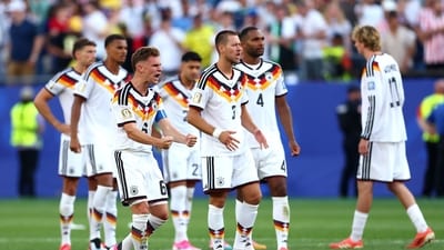 Joshua Kimmich celebrates as Jamal Musiala scores the team's third penalty in GER vs PAR. (Getty Images via AFP) Joshua Kimmich celebrates as Jamal Musiala scores the team's third penalty in GER vs PAR. (Getty Images via AFP)