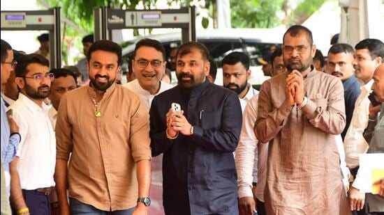 MLC Sachin Ahir (in black) arrives for the monsoon session of the state legislature, in Mumbai on Wednesday (Bhushan Koyande/HT Photo)