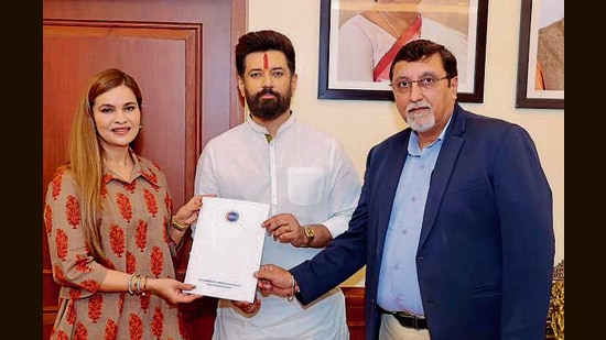 Union minister Chirag Paswan with PHDCCI chairperson Himani Arora and deputy secretary general Naveen Seth in Chandigarh on Wednesday. (HT Photo)