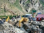 BRO personnel use excavators to clear debris from the Manali-Leh Highway near Jispa after a cloudburst triggered flash floods, in Lahaul and Spiti district, Himachal Pradesh, on Wednesday. (PTI)