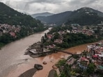 Dense clouds hover over Mandi town and the Beas River amid an Orange Alert issued for July 2 and 3. The river is currently flowing at its normal level with no signs of flooding, in Mandi on Wednesday. (ANI Video Grab) Dense clouds hover over Mandi town and the Beas River amid an Orange Alert issued for July 2 and 3. The river is currently flowing at its normal level with no signs of flooding, in Mandi on Wednesday. (ANI Video Grab)