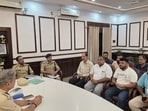 Family members of Himanshu Singh meet Jharkhand ADG (CID) and zonal IG Manoj Kaushik on Thursday (HT PHOTO)