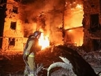 Firefighters work at the site of an apartment building hit by a Russian airstrike on Ukraine, in the town of Kramatorsk, Donetsk region on Tuesday. (REUTERS)