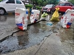 Thane, India - July -01, 2026: Following heavy rainfall in Thane, a portion of the road adjacent to a drainage chamber near the Three Petrol Pump area has caved in, resulting in a large pothole ,in Thane ,in Mumbai, India, on, Wednesday, July -01, 2026. ( photo by Praful Gangurde / Hindustan Times ) (praful Gangurde)