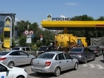 Vehicles queue to refuel at a Rosneft petrol pump, as according to local officials some regional filling stations face gasoline shortages due to production cuts at major refineries, amid the Russia-Ukraine conflict 
