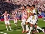 Despite being reduced to 10 men, the USA wrapped up the victory when Malik Tillman curled a superb free-kick into the net, putting the result beyond Bosnia and Herzegovina's reach.&nbsp;(AP Photo)