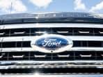 The Ford Motor emblem is seen on the bumper of a vehicle at the Leif Johnson Ford dealership on June 30h.